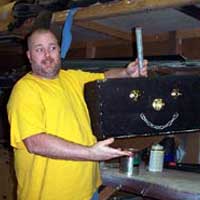 About the photo: Searcy works on the head of a robot for a touring children’s theater production.